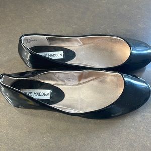 Black Steve Madden patent leather slip ons